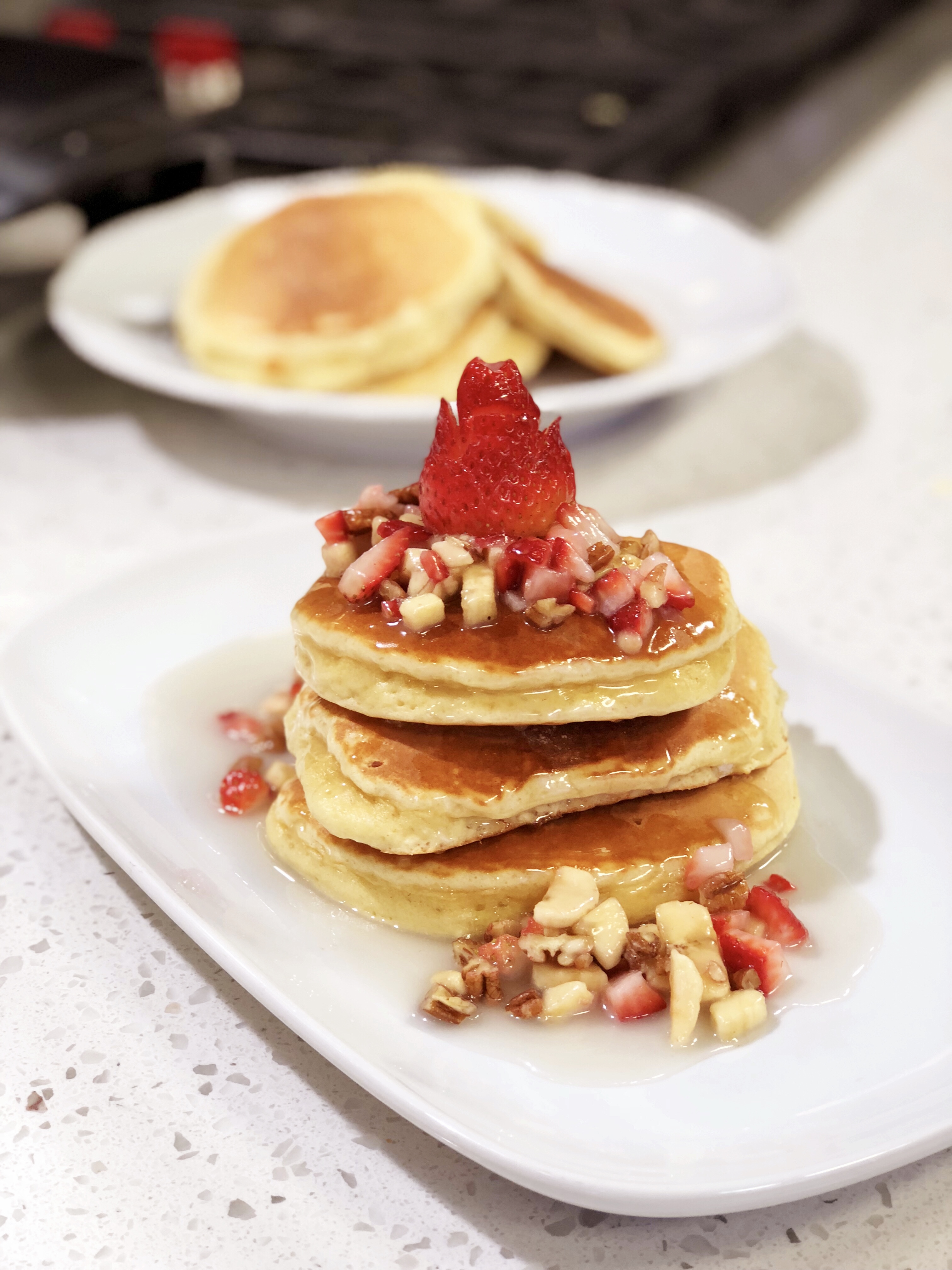Souffle Pancakes with Strawberry Bananas and Pecans