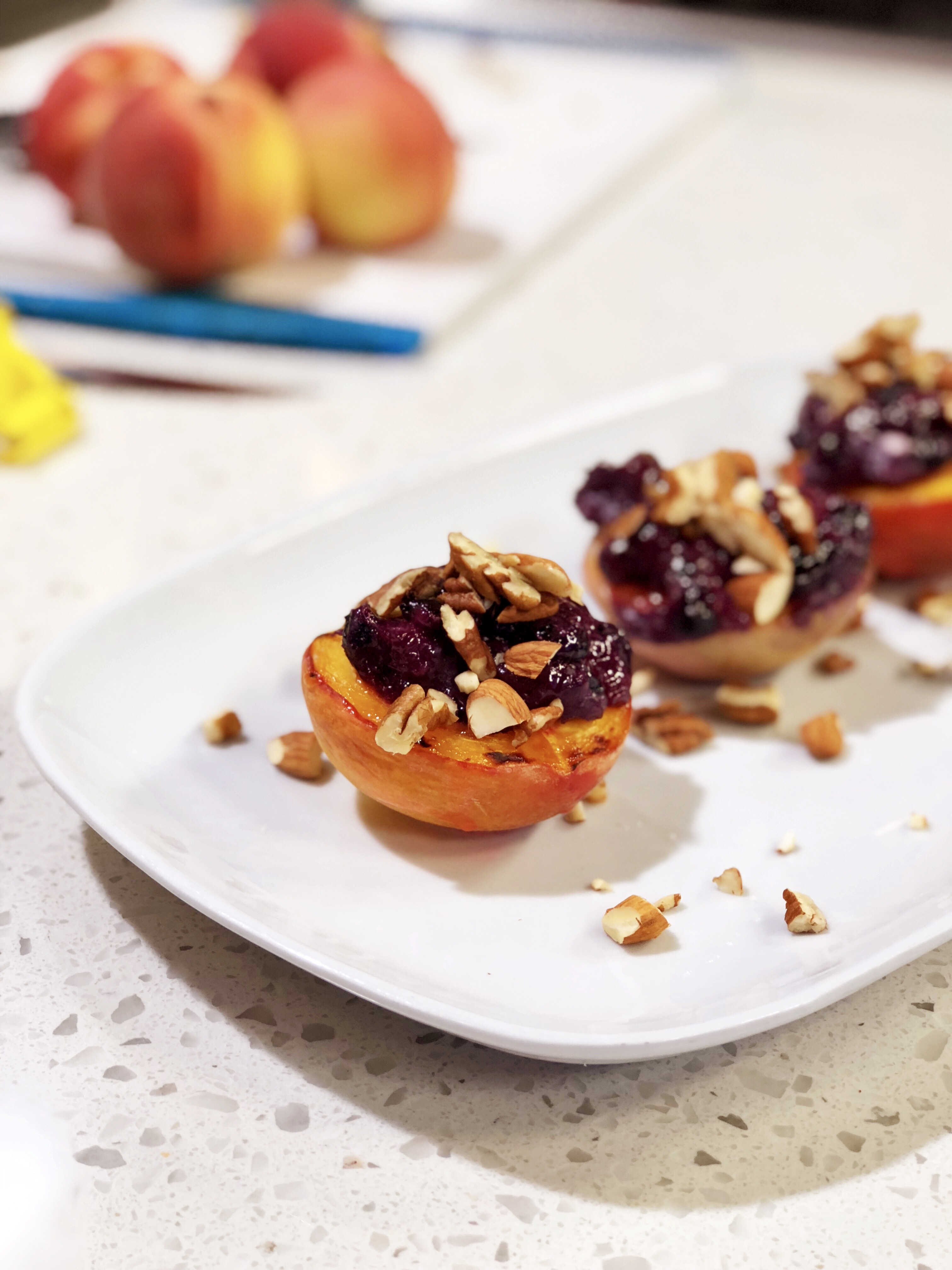 Glazed Peaches, Broiled with Blueberry Compote and Cream Cheese