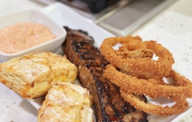 Marinated Steak Dinner with Cheddar Biscuits and Onion Rings