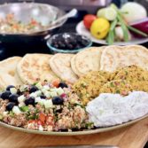 Falafel Patties, Cucumber Sauce, Tabouleh Salad and Pitta Bread