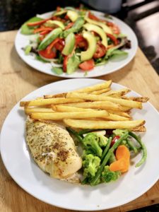 Roasted Chicken Breasts with Vegetables, French Fries and Green Salad