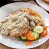 Pan Seared Pork Chop with Mushroom Dijon Gravy, Cinnamon Apples and a Cucumber Carrot Salad