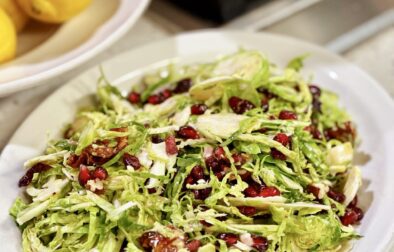 Irresistible Shaved Brussels Sprouts Salad with Pomegranate and Candied Pecans
