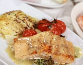 Roasted Salmon with Creamy Lemon Sauce, Cabbage Steaks, and Blistered Tomatoes