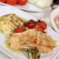 Roasted Salmon with Creamy Lemon Sauce, Cabbage Steaks, and Blistered Tomatoes