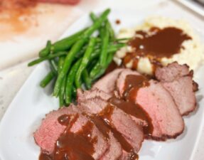 Garlic and Tri-Pepper Crusted Roast with Balsamic Sauce