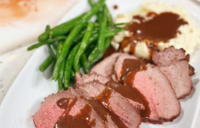 Garlic and Tri-Pepper Crusted Roast with Balsamic Sauce