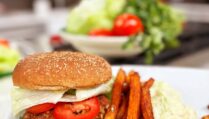 Flavorful Black Bean Burgers with Avocado Crema & Sweet Potato Fries