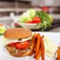 Flavorful Black Bean Burgers with Avocado Crema & Sweet Potato Fries